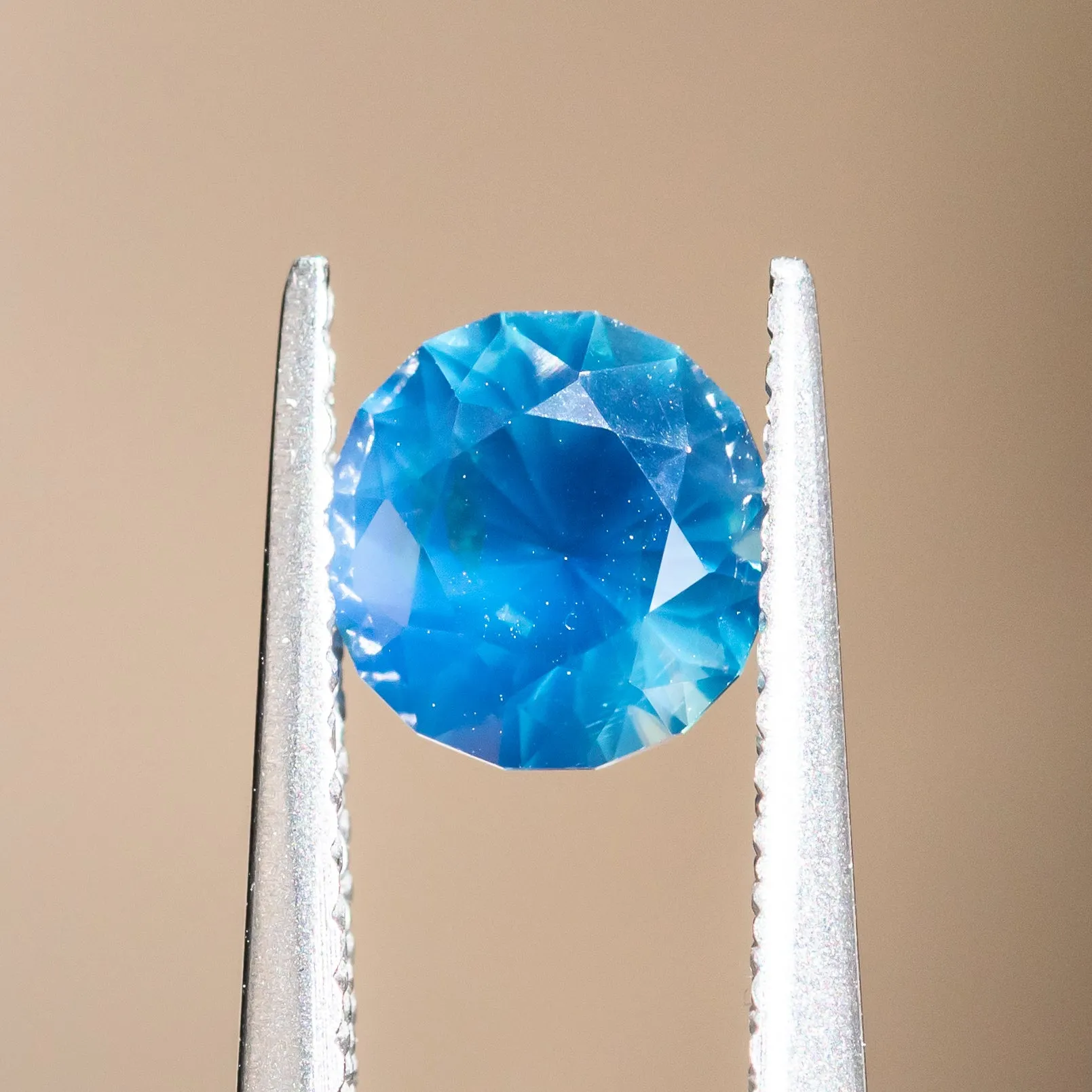 1.29CT ROUND GOMBE NIGERIAN SAPPHIRE, DEEP TEAL BLUE, 6.45X4.26MM