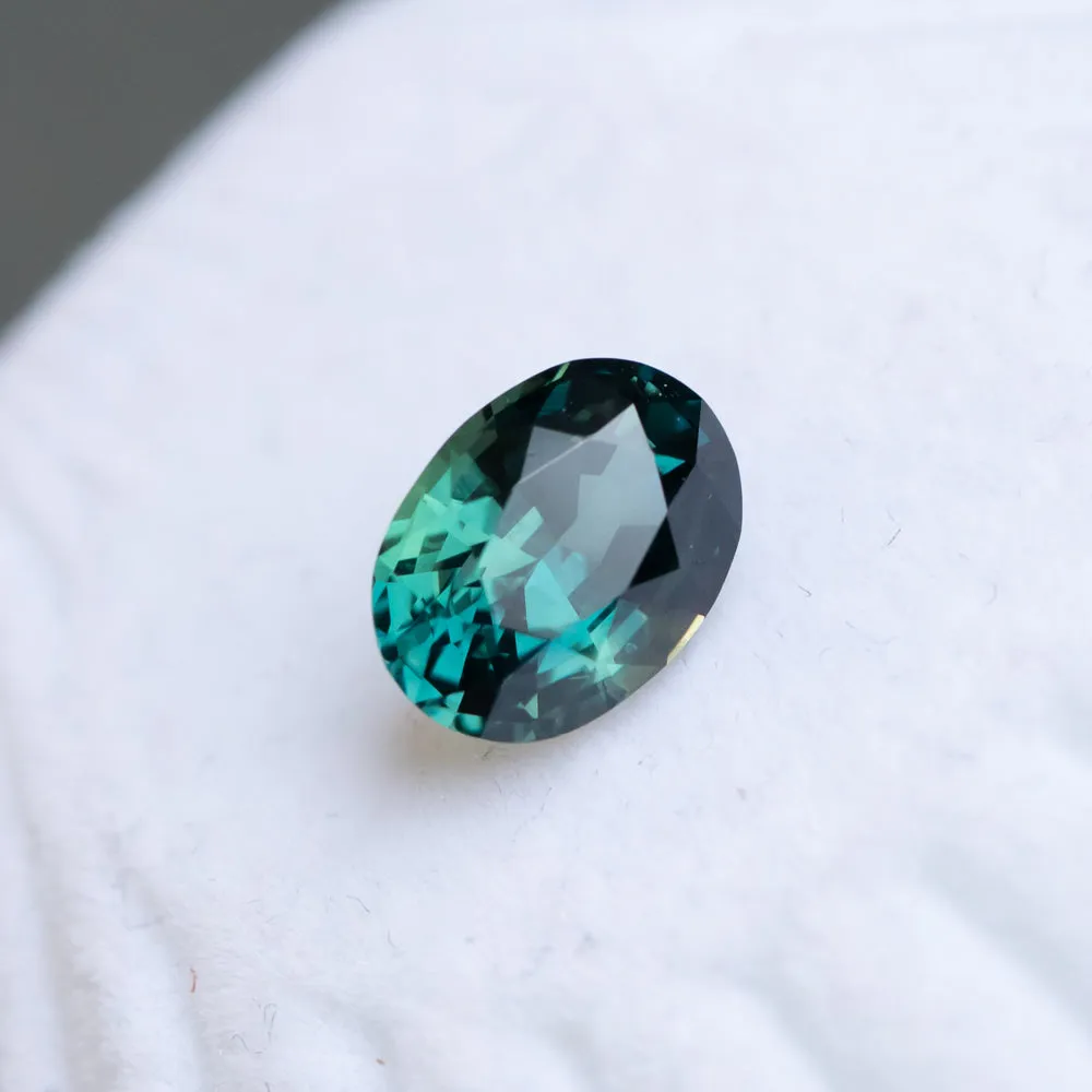 3.19CT OVAL MADAGASCAR SAPPHIRE, DEEP TEAL WITH GREEN, 10X7X4.1MM, UNTREATED