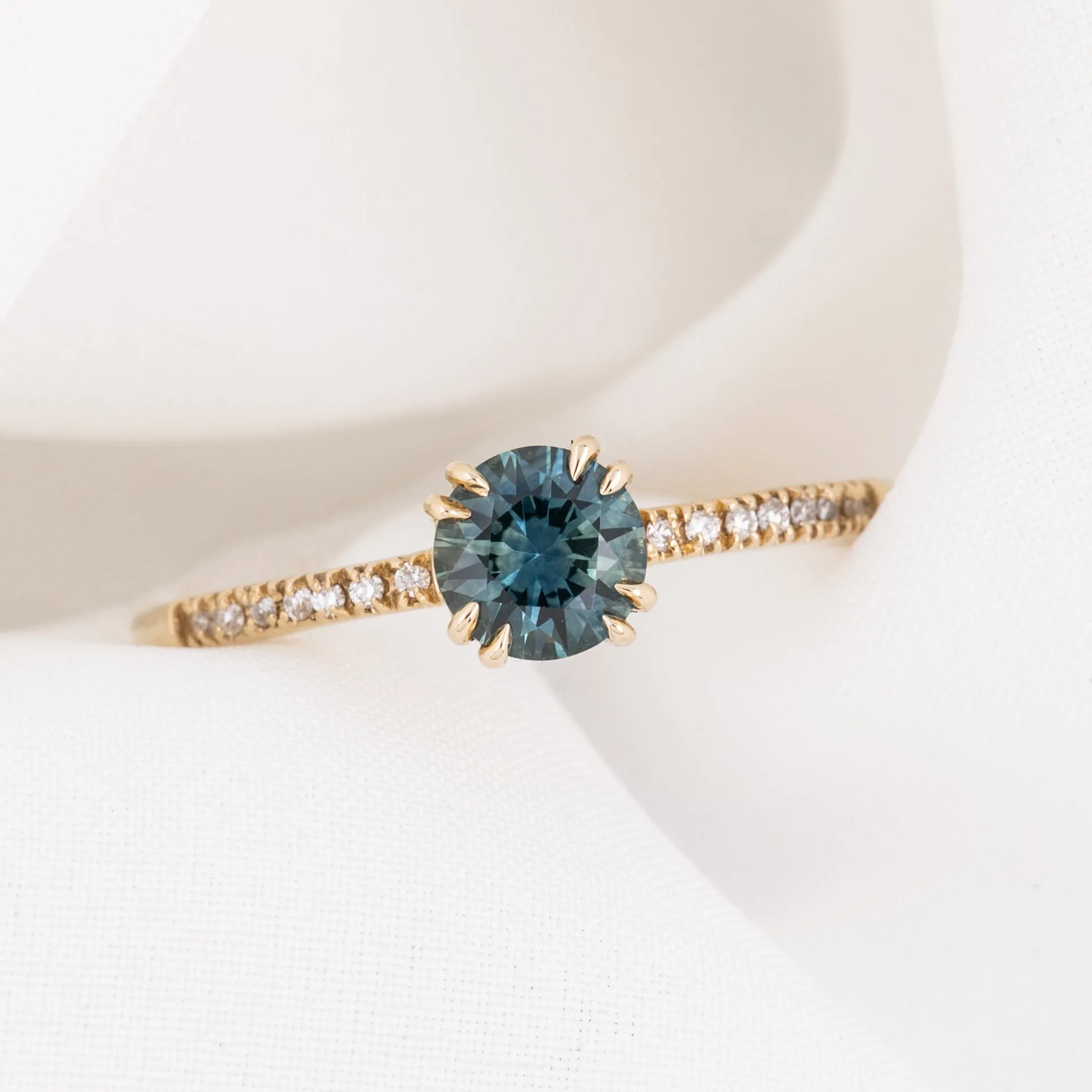 Sabrina Ring 0.71ct Blue Green Round Montana Sapphire, 14k yellow gold (One of a kind)